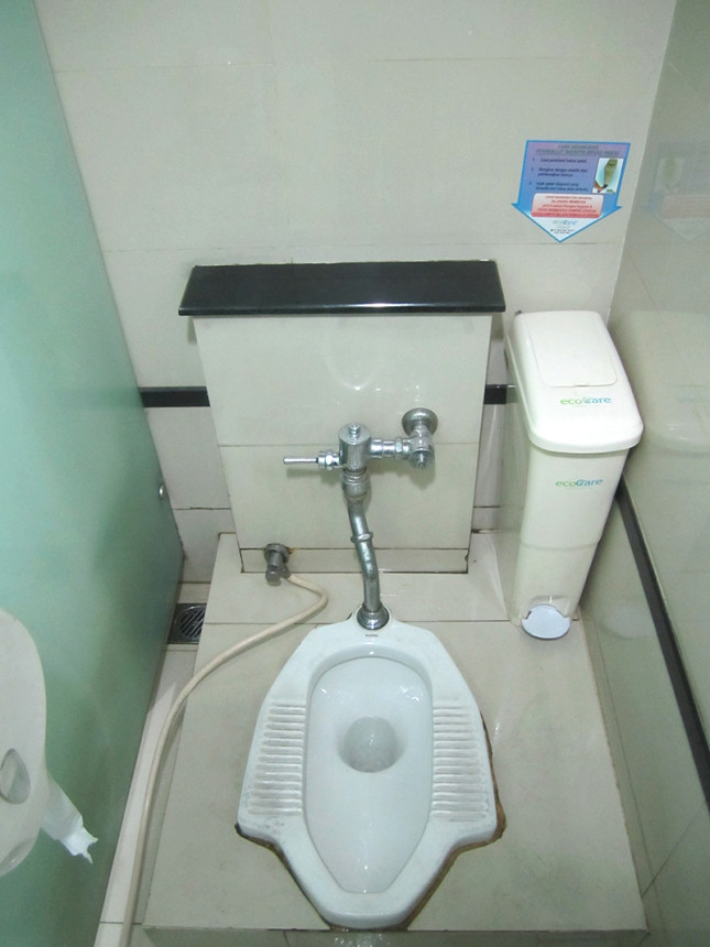 squat toilet at a public restroom.